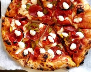 Small pepperoni and cheese red sauce pizza